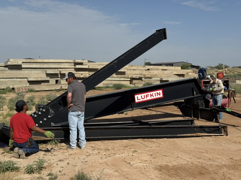 The crew at Tim Snelson's Pumping Unit Service, Midland, Texas