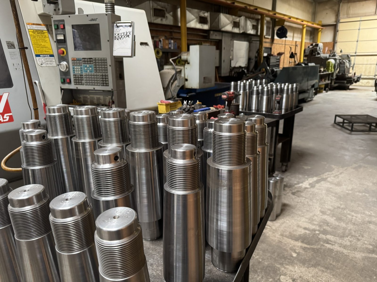 Custom-machined pump jack shafts from Snelson's HAAS centers, Midland TX